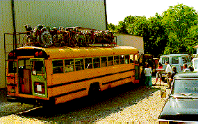 (Photo of bus loaded with supplies)